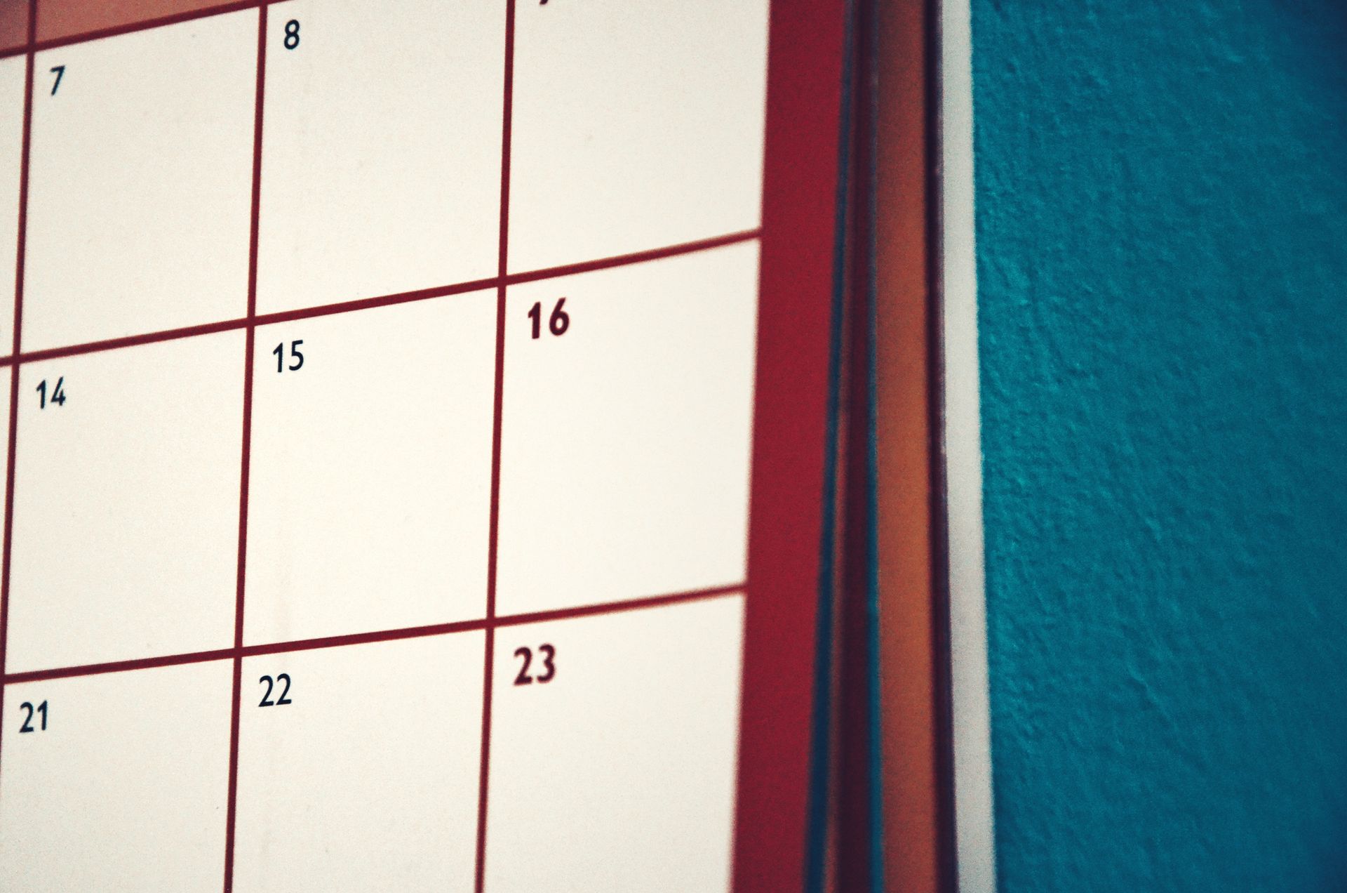 Minimal monthly calendar hanging on a wall