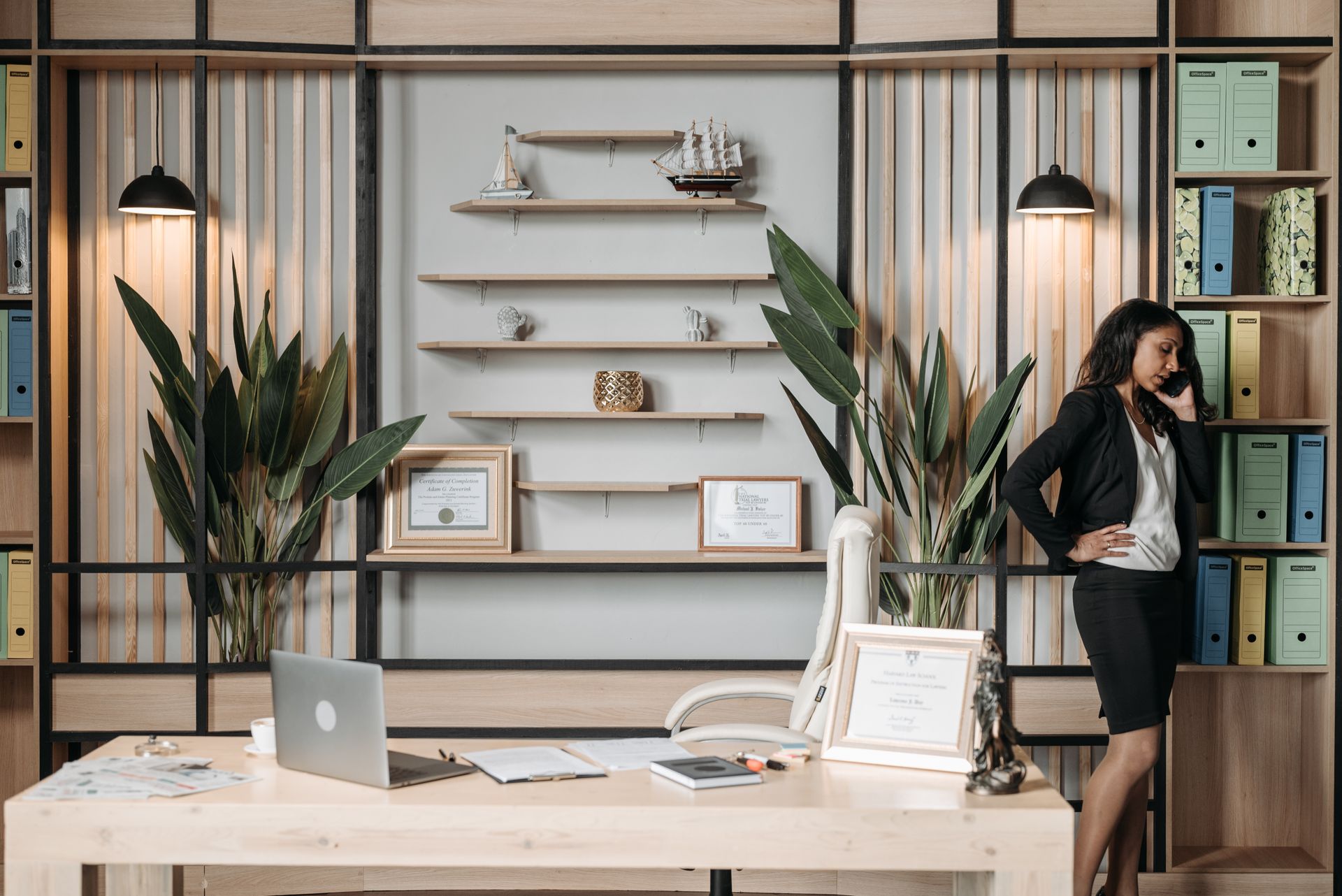 Female attorney taking a phone call at her desk