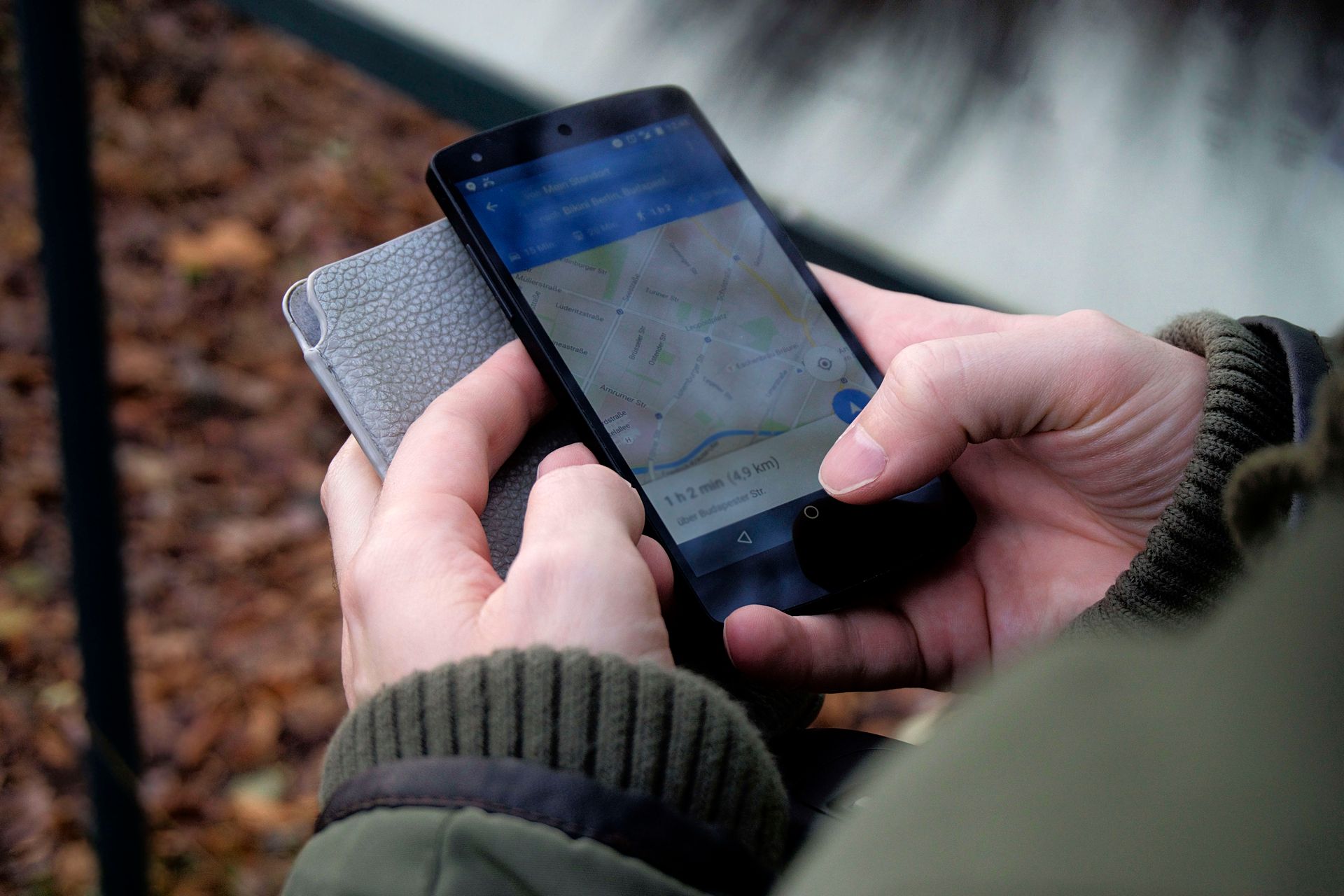 Person using the Google Maps app on a smartphone